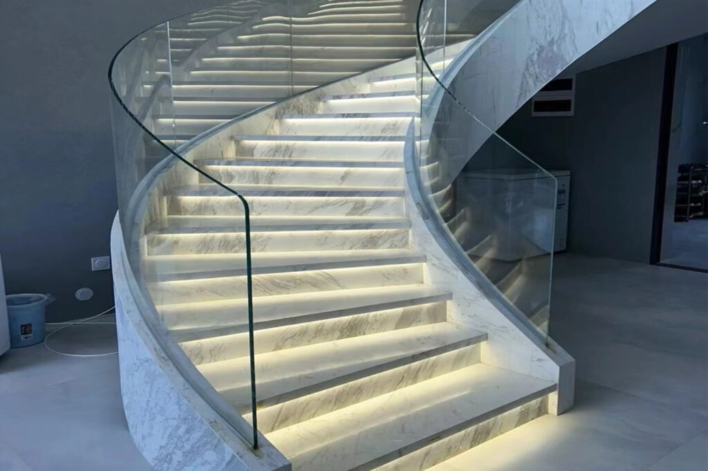 Custom curved glass installation for luxury interior design